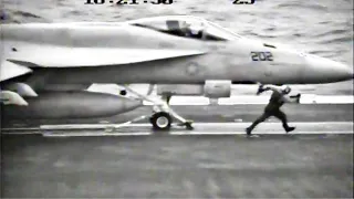 Drop tank falls from F-18 on catapult shot (USS Kitty Hawk)