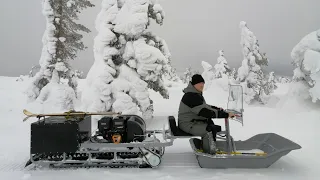 Мототолкач штурмует высокую снежную гору.  Отзыв снегоходчика