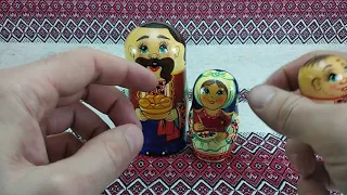 Wooden nesting doll "Ukrainian family" - handmade, artist' painting.