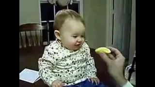 Funny video Baby Eats a Sour Lemon Ребенок ест кислый лимон