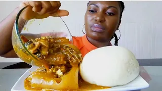 Nigerian food ogbono soup with poundo yam fufu