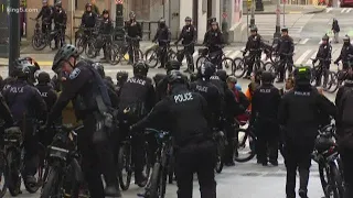 4 arrests after dueling protests in Seattle Sunday