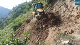 JCB Backhoe Loader Real-Clearing Land Slide in Hilly Region