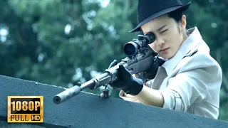 The female agent is a sharpshooter and takes away the  commander with one shot from the crowd.