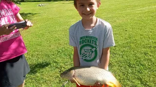 Little brother catching a 7 lb carp!!!!