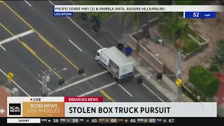 A stolen truck pursued by police is moving around 60 MPH along PCH through Malibu