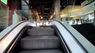 An escalator journey in Zürich