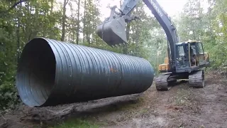 Big Culvert In The Woods And A Barn Pad