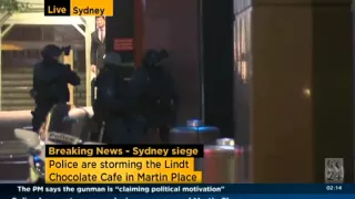 Sydney siege: Heavily armed police storm Lindt cafe in Martin Place