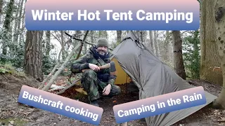 Solo hot tent winter camping in the rain. Bushcraft cooking. Carving a spoon. Outdoors. Adventure.