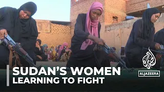 Sudan’s women attend training camps to learn how to fight