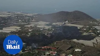 La Palma volcano: Drone footage shows the devastation caused by the black lava streams