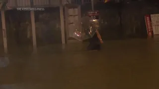 Chaos in Hong Kong as heavy rain floods roads