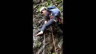Barefoot  climbing in river