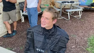 Guy loses a bet and gets a haircut