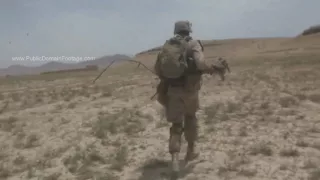 War in Afghanistan - Firefight and moving positions POV archival footage