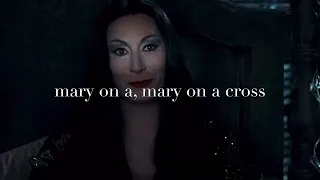 Mary On A Cross (Gomez and Morticia)