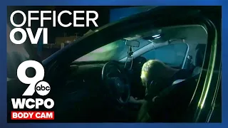 Body cam: Off-duty police officer arrested after being found asleep at the wheel