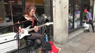 London Street Music. Singer and Guitarist Seen and Heard in Brick Lane