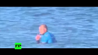 PARODY - Shark attack champion surfer Mick Fanning in South Africa