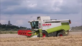 Claas Lexion 450 Evolution im Weizen, JohnDeere 6215R.