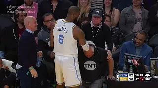 LeBron James helps out the cameraman by catching the camera after falling 🤝