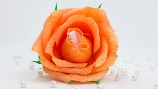 Orange roses made of candy and crepe paper with your own hands