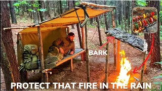 Solo Overnight Building A Raised Shelter and Covered Fire In The Rain and Bacon Ribeye Kabobs