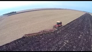Versatile 550 Delta Track tractor pulling a Salford 14 bottom plow