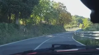 Driving a Ferrari 360 in Italian mountains.