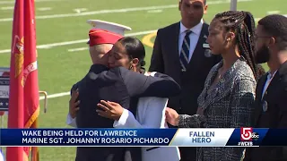 Gold Star families embrace as final respects paid to fallen Marine