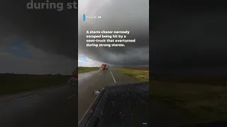 Semi-truck overturns, hits vehicle amid tornado supercell #Shorts