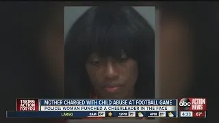 Mother charged with child abuse at football game