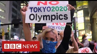 Japan argues over looming Olympics as Covid emergency extended - BBC News