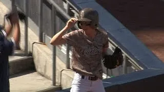 Ballgirl leaps for a terrific catch on foul