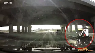 Dash cam captures motorcyclists speeding before crashing on highway