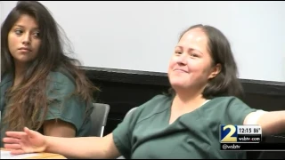 Woman charged with murder in deaths of children and husband makes court appearance