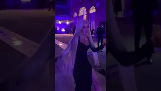 Doja Cat dances with drink in her hand