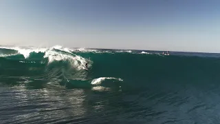 Surfers take on a heavy slab south of Sydney