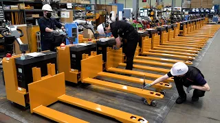 The process of making an electric pallet forklift. Forklift mass production factory in South Korea