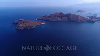 Drone footage of Komodo National Park, Indonesia with Padar island and its rocky hills and beache...