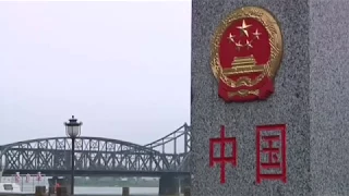 China's border city with North Korea eases tourism curbs - sources