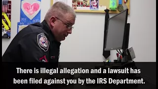 Police officer scams IRS scammer in viral video