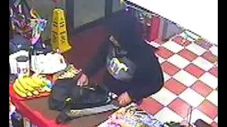 Police search for robbery suspect armed with machete