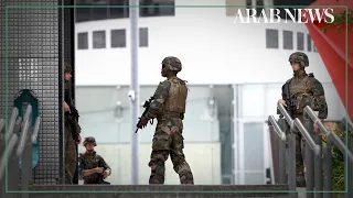 Paris business district evacuated after armed man reported