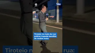 Tiroteio no meio da rua: policial impede bandido de roubar moto #Shorts