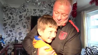 Steve Evans visits young fan before Christmas