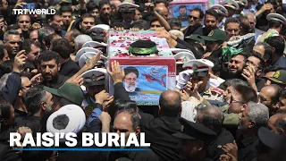 Thousands of mourners attend Raisi's burial