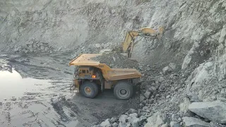 Powerful Machines Working at Another Level Komatsu PC4000 Excavator Loading XCMG XDE260 Mining Truck