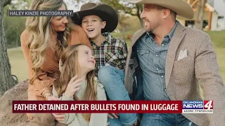 Father detained after bullets found in luggage